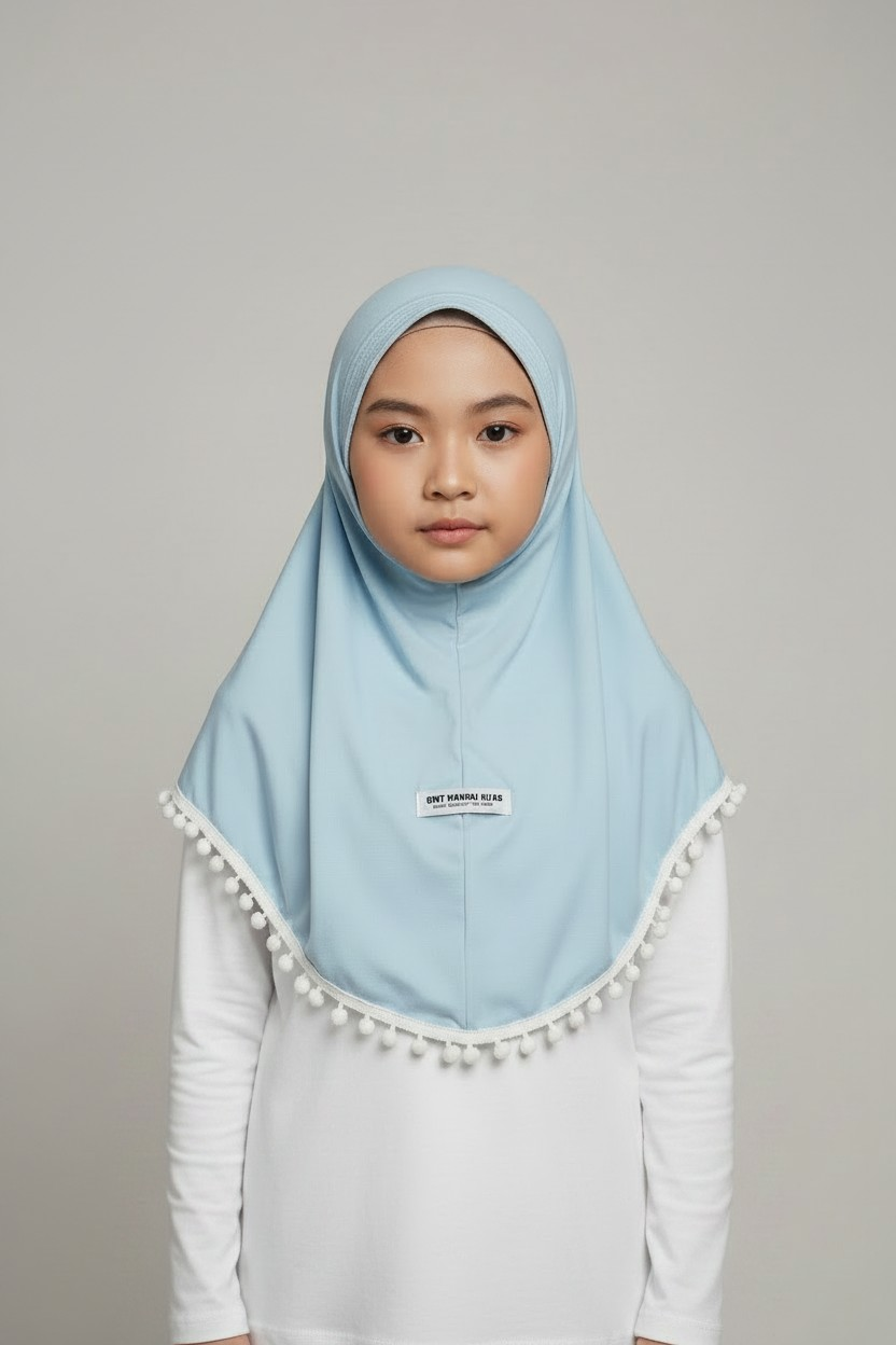 The Manhal Hijab — Girls’ Light Blue Pull-On Hijab with White Pom-Pom Trim